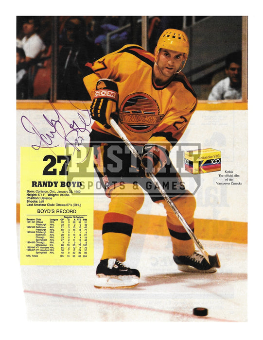 Randy Boyd Autographed 8X10 Magazine Page Vancouver Canucks Away Skate Jersey (With Puck) - Pastime Sports & Games