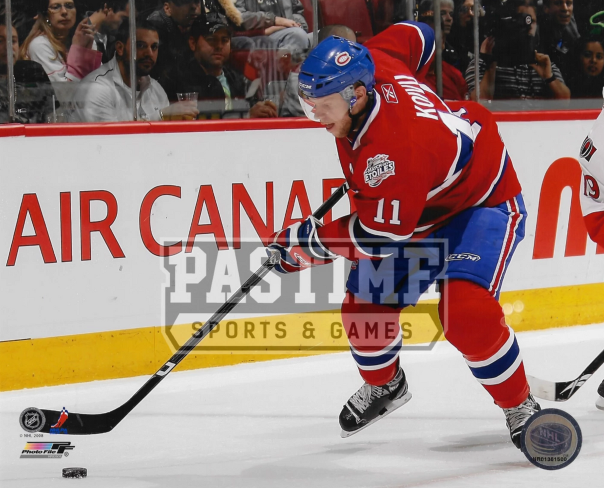 Saku Koivu 8X10 Montreal Canadians Home Jersey (Skating WIth Puck