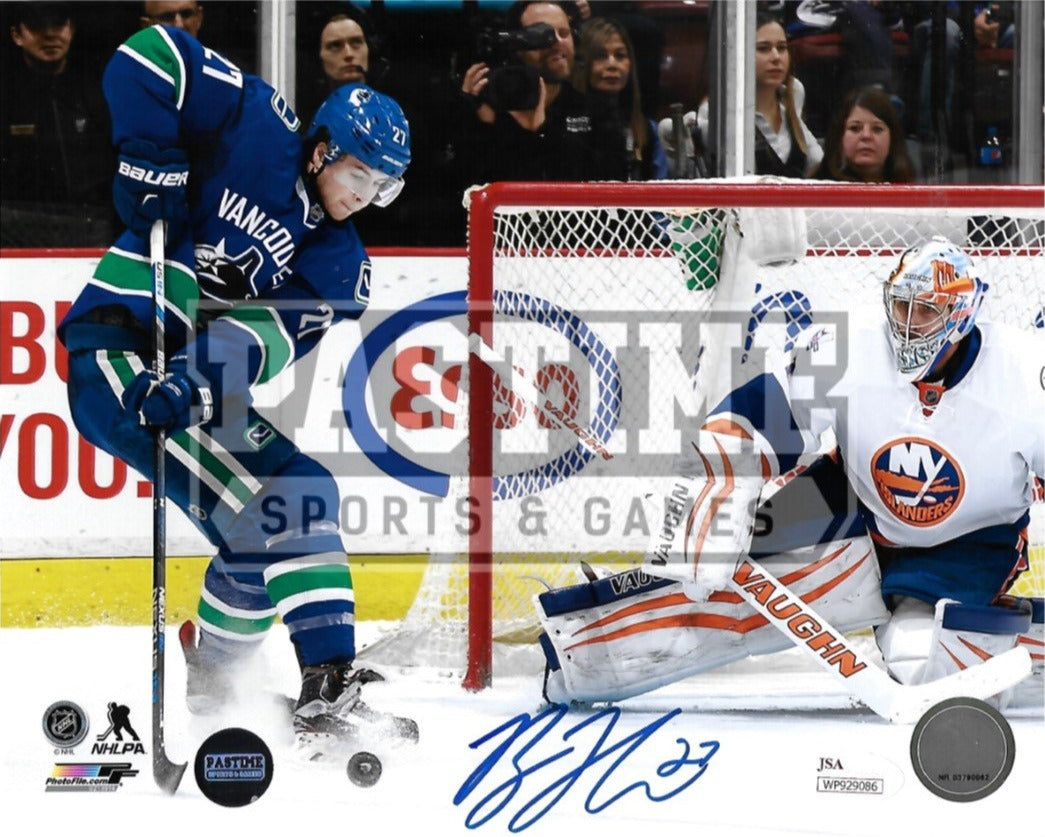 Ben Hutton Autographed 8X10 Vancouver Canucks Home Orca Jersey (About To Shoot) - Pastime Sports & Games