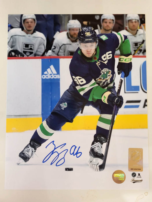 Andrei Kuzmenko Autographed Vancouver Canucks Photo (Skating With Puck) - Pastime Sports & Games
