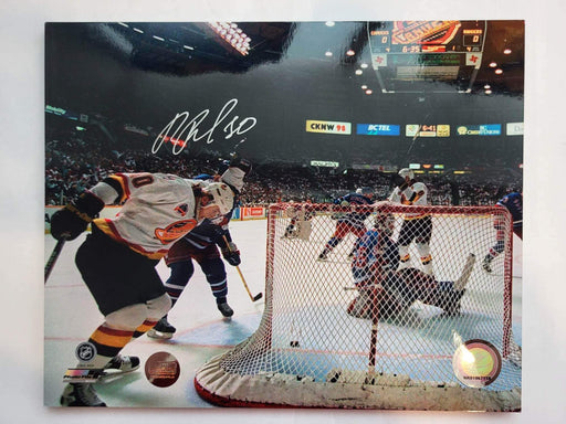 Pavel Bure 8X10 Autographed Vancouver Canucks Away Jersey (by goalie net) - Pastime Sports & Games