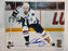 Markus Naslund 8X10 Autographed Photo (White Skating with puck) - Pastime Sports & Games